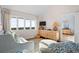 Bright guest bedroom with large windows providing beautiful ocean views at 2238 Catesbys Blf, Seabrook Island, SC 29455