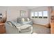 Spacious bedroom with an oversized chair, love seat, and amazing ocean view at 2238 Catesbys Blf, Seabrook Island, SC 29455