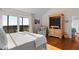 Bedroom features a balcony with ocean view and wooden armoire at 2238 Catesbys Blf, Seabrook Island, SC 29455