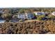 Striking home showcasing a two-story design, a large deck, and picturesque coastal landscaping at 2238 Catesbys Blf, Seabrook Island, SC 29455