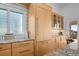 Kitchen showing granite counters, wood cabinets, and stainless appliances at 2238 Catesbys Blf, Seabrook Island, SC 29455