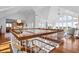 Open-concept home with a view of the living room, a dining area, and lots of natural light at 2238 Catesbys Blf, Seabrook Island, SC 29455