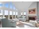 Living room showcases ocean views, a fireplace, and stylish furnishings at 2238 Catesbys Blf, Seabrook Island, SC 29455