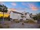 Beautiful home with multi-level balconies and tropical plants at 2238 Catesbys Blf, Seabrook Island, SC 29455