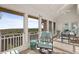 Sun room with outdoor seating and expansive ocean views at 2238 Catesbys Blf, Seabrook Island, SC 29455