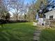 Expansive backyard showcasing lush green lawn, and a patio area perfect for outdoor enjoyment at 2320 Chadbury Ln, Mount Pleasant, SC 29466