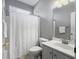 Bright bathroom featuring white fixtures, shower with curtain, and a neutral color scheme at 2320 Chadbury Ln, Mount Pleasant, SC 29466