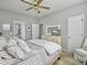 Light-filled main bedroom with a ceiling fan, neutral colors and a serene atmosphere at 2320 Chadbury Ln, Mount Pleasant, SC 29466