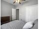 Bedroom featuring a bed, closet with folding doors, and dresser at 2320 Chadbury Ln, Mount Pleasant, SC 29466