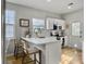 Modern kitchen features white cabinets, stainless steel appliances, and a stylish backsplash at 2320 Chadbury Ln, Mount Pleasant, SC 29466