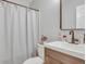 A cozy bathroom featuring a single sink, tile floors, and a bathtub with shower at 2420 Cherokee Hall Ln, Charleston, SC 29414