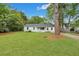 Charming single-story home with a well-manicured lawn and inviting front porch at 2420 Cherokee Hall Ln, Charleston, SC 29414