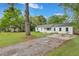 Charming one-story home with a large yard and mature trees at 2420 Cherokee Hall Ln, Charleston, SC 29414