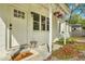 Inviting front porch features a charming entrance, decorative touches, and curb appeal at 2420 Cherokee Hall Ln, Charleston, SC 29414