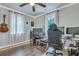 Gaming room with hardwood floors, string lights, and two gaming setups at 2420 Cherokee Hall Ln, Charleston, SC 29414