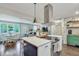 Open kitchen area with stainless steel range hood at 2420 Cherokee Hall Ln, Charleston, SC 29414