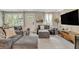 Living area with a large sectional sofa and lots of natural light at 2420 Cherokee Hall Ln, Charleston, SC 29414