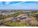 An eye-level aerial view of the community and waterway at 2615 Rutherford Way, Charleston, SC 29414
