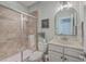 Stylish bathroom with a glass-enclosed shower, granite vanity, and modern fixtures at 2615 Rutherford Way, Charleston, SC 29414