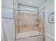 Clean bathroom featuring a glass-enclosed shower-tub combination with tiled walls and recessed lighting at 2615 Rutherford Way, Charleston, SC 29414
