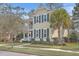 Charming two-story home with double porches, neat landscaping, and a walkway at 2615 Rutherford Way, Charleston, SC 29414