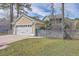 Detached two-car garage with white doors and concrete driveway at 2615 Rutherford Way, Charleston, SC 29414