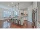 Eat-in kitchen features stainless appliances, a granite island with seating, and adjacent breakfast area at 2615 Rutherford Way, Charleston, SC 29414