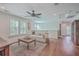 Upstairs living room with hardwood floors, bright windows, and stylish furnishings at 2615 Rutherford Way, Charleston, SC 29414