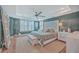 Serene main bedroom with trey ceiling, ceiling fan, neutral tones, and shuttered windows at 2615 Rutherford Way, Charleston, SC 29414