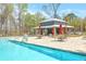 Community pool and clubhouse provide resort-style living in a serene and natural setting at 2615 Rutherford Way, Charleston, SC 29414