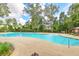 Well-maintained community pool with plenty of space to swim and relax on a sunny day at 2615 Rutherford Way, Charleston, SC 29414