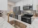 Modern kitchen with stainless steel appliances, marble countertops, and white cabinetry at 274 Alexandra Dr # 14, Mount Pleasant, SC 29464