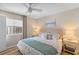 Comfortable main bedroom featuring a ceiling fan, bedside tables and view of the community at 274 Alexandra Dr # 14, Mount Pleasant, SC 29464