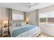 Bright main bedroom featuring a ceiling fan, bedside tables and a window to let the sun in at 274 Alexandra Dr # 14, Mount Pleasant, SC 29464
