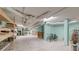 Large, unfinished basement with concrete floors, cinder block walls and exposed ductwork at 31 Berkshire Hall, Kiawah Island, SC 29455