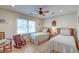 This bedroom is comfortably furnished with twin beds and a relaxing rocking chair at 31 Berkshire Hall, Kiawah Island, SC 29455