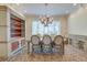 Elegant dining room featuring a decorative light fixture, and storage cabinets at 31 Berkshire Hall, Kiawah Island, SC 29455