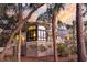 Stunning exterior view of the home featuring large windows, multiple balconies, and lush landscaping at 31 Berkshire Hall, Kiawah Island, SC 29455