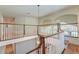 An elegant foyer featuring white railings and a view of the stairs and chandelier at 31 Berkshire Hall, Kiawah Island, SC 29455