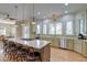 Spacious kitchen featuring a large island, stainless steel appliances, and ample counter space at 31 Berkshire Hall, Kiawah Island, SC 29455