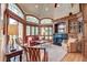 Bright living room with large windows, fireplace, and comfortable seating at 31 Berkshire Hall, Kiawah Island, SC 29455