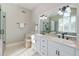 The bathroom has a double vanity, a large mirror, and a glass-enclosed shower at 31 Berkshire Hall, Kiawah Island, SC 29455
