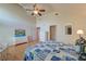 Spacious main bedroom with light hard floors, a ceiling fan, and plenty of natural light at 31 Berkshire Hall, Kiawah Island, SC 29455