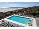 Resort pool and lounging area with ocean views at 31 Berkshire Hall, Kiawah Island, SC 29455