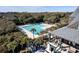 Community pool area with lounging and shade trees at 31 Berkshire Hall, Kiawah Island, SC 29455