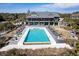 Beautiful aerial view of a large pool surrounded by lounge seating near the clubhouse at 31 Berkshire Hall, Kiawah Island, SC 29455