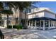 Attractive retail storefront with manicured landscaping and covered awning at 31 Berkshire Hall, Kiawah Island, SC 29455