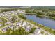 Aerial view of lakeside homes with community pool and well-manicured lawns at 3699 Goodwater St, Mount Pleasant, SC 29466