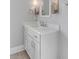 Bathroom featuring a white vanity with drawers and cabinets, modern sink fixtures, and decorative lighting at 3699 Goodwater St, Mount Pleasant, SC 29466