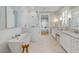 Bright bathroom featuring a standalone tub, a glass enclosed shower, and double sinks at 3699 Goodwater St, Mount Pleasant, SC 29466